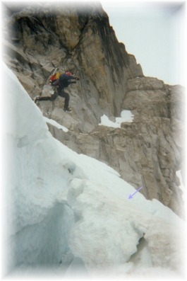 Jumping a crevasse on the Sherpa Glacier after climbing the Ice Cliff Glacier on Mt. Stuart